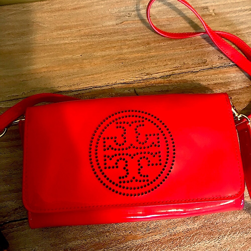 Tory Burch stunning red patent leather handbag.